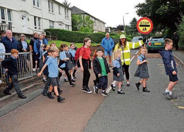 Opposition to school crossing axe