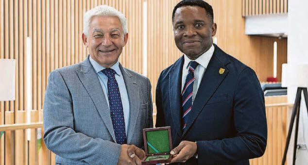 Uni lecturer dedicates top medal to everyone breaking down barriers