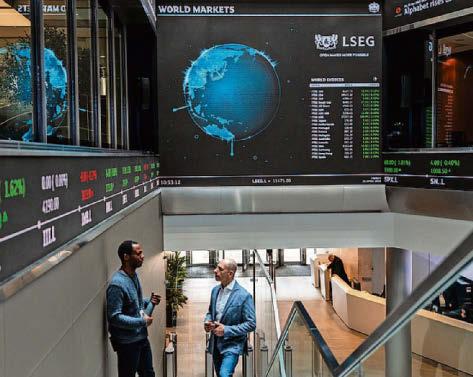 FTSE smashes 10,000 mark as Rolls-Royce and Fresnillo rally