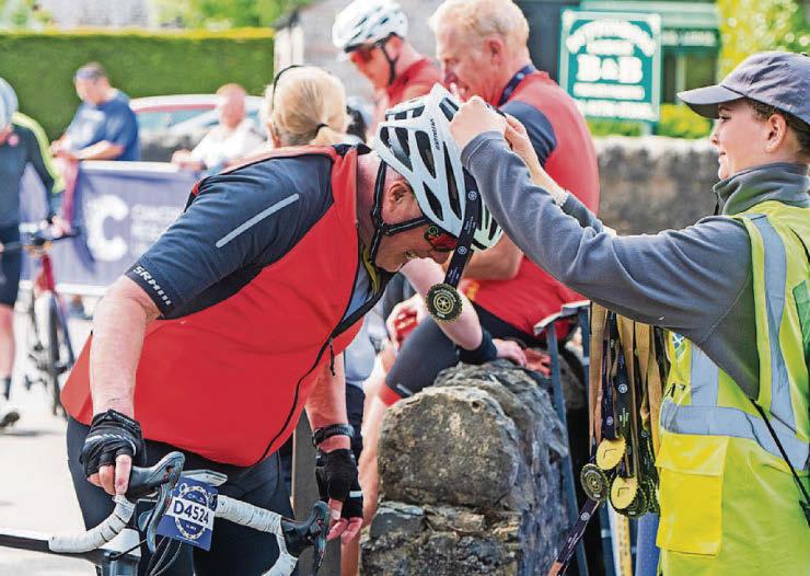 Cyclists go the distance for cancer charity across Highland Perthshire