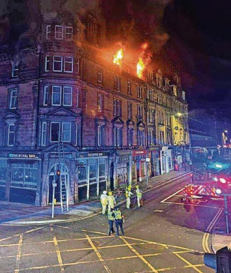 Terrified couple trapped by flames feared they faced impossible 'jump or burn' in narrow escape