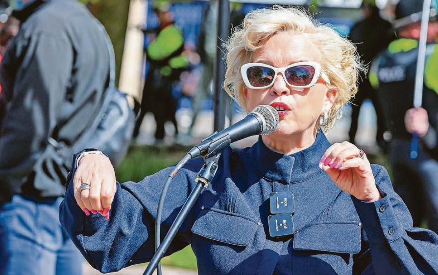 Rally and counter-protest attract large police presence