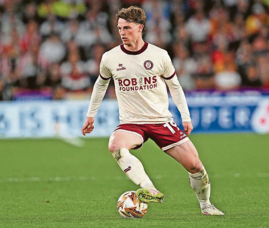 Football Tanner delighted to extend 'home' stay for three more years