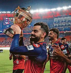 Kohli finally gets his hands on IPL trophy after 18-year wait