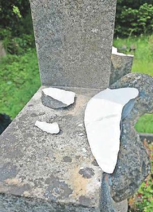 Vandals Graves at historic cemetery suffer damage