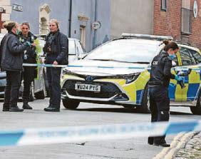 Police hunt two attackers after man and woman were set upon in the street