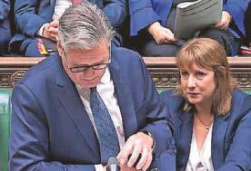 Chancellor appears upset as PM dodges backing her