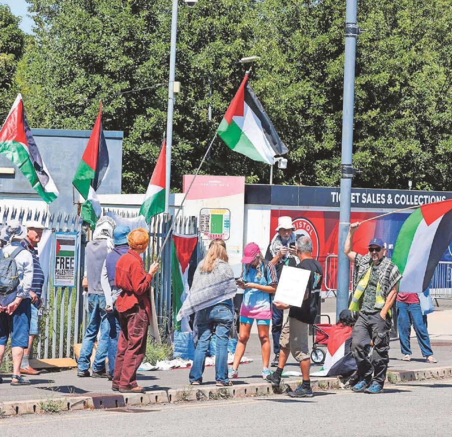 Activists block stadium entrance in arms protest