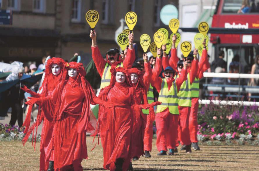 Separate groups stage colourful protest ahead of council meeting