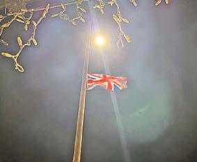 ‘Together we thrive' Flags replaced by welcoming sign