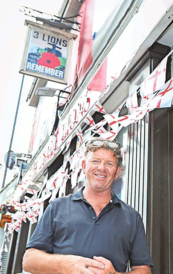 Long-standing flag display at city pub pulled down