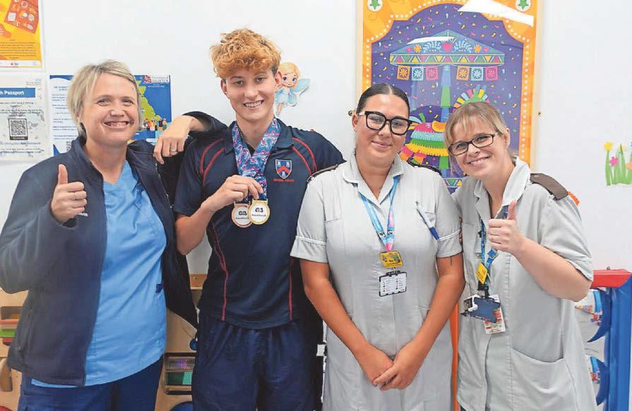 'So grateful' Teen swimming champ returns to hospital to thank medics