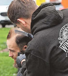 'It's good to give back' Barbers give out free haircuts to the homeless