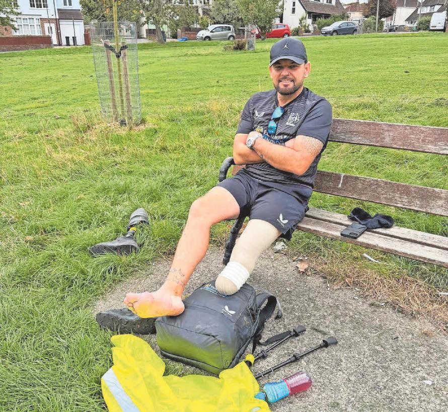 Ex-Marine endures pain of broken leg on charity trek