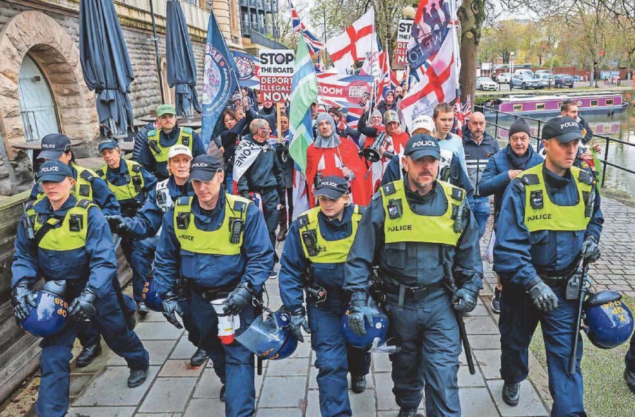 Protests Five arrested and officer in hospital following city disorder