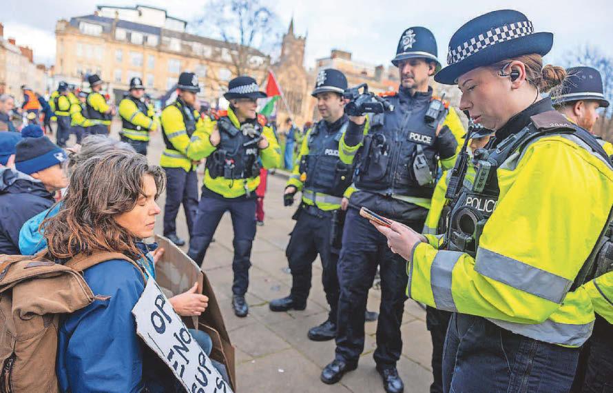 Palestine Action protest Ex-royal adviser among 31 arrested in city