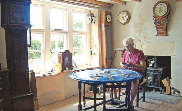 Historic clock returns home after restoration