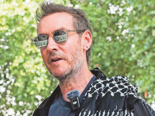 Band pull songs from app in AI defence links protest