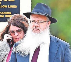 Synagogue hero hailed as 'martyr' at funeral