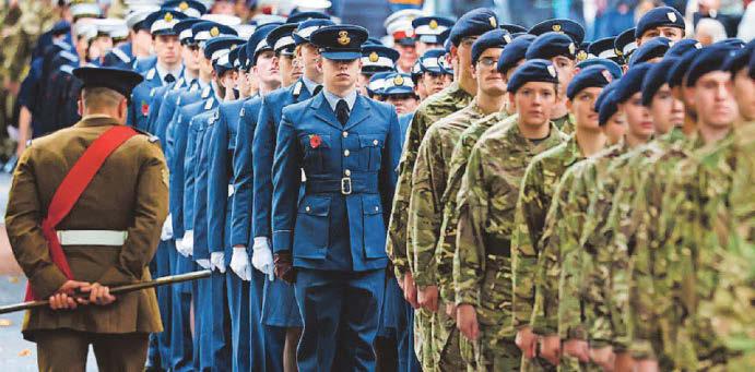 Troops march to cenotaph in city to remember war dead