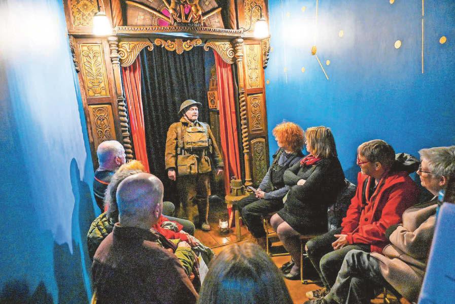 Curtains up! World's smallest theatre reopens at last after fire
