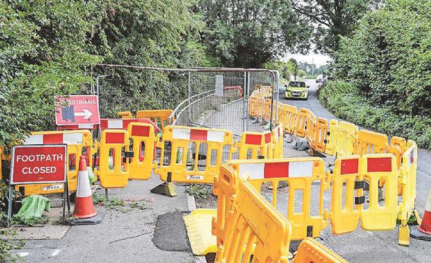 Councillor questions cost of lights at sinkhole