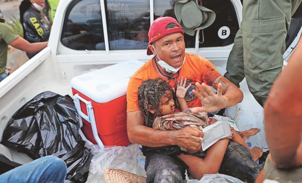 Venezuela jolted by aftershock as search goes on