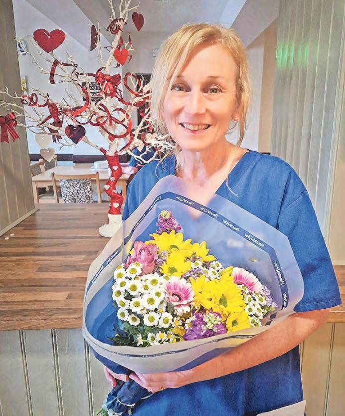 Carer Nicky rewarded for 'decade of service'