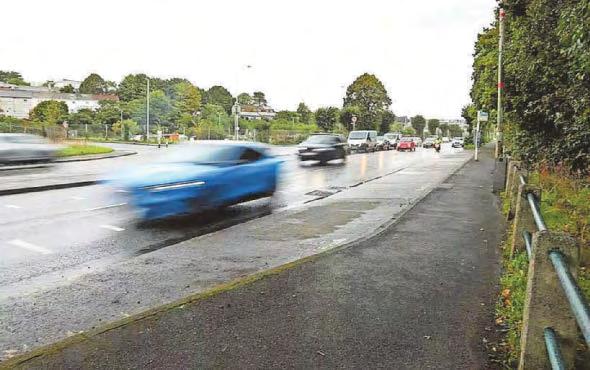 Lower speed limit for mile of major city route