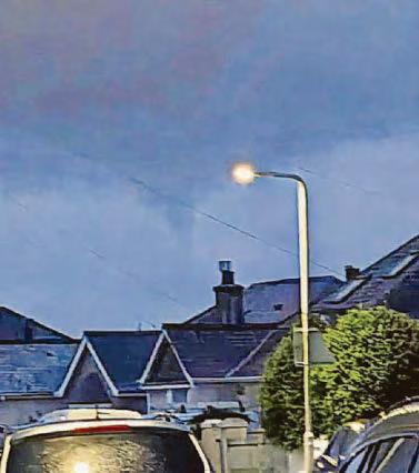 'Tornado' pictured over city rooftops