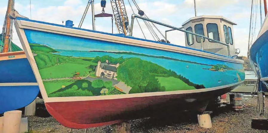 Mural boat salvaged after mystery sinking