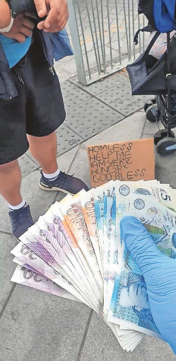 'Beggar' had laptop, cash and mobile phones