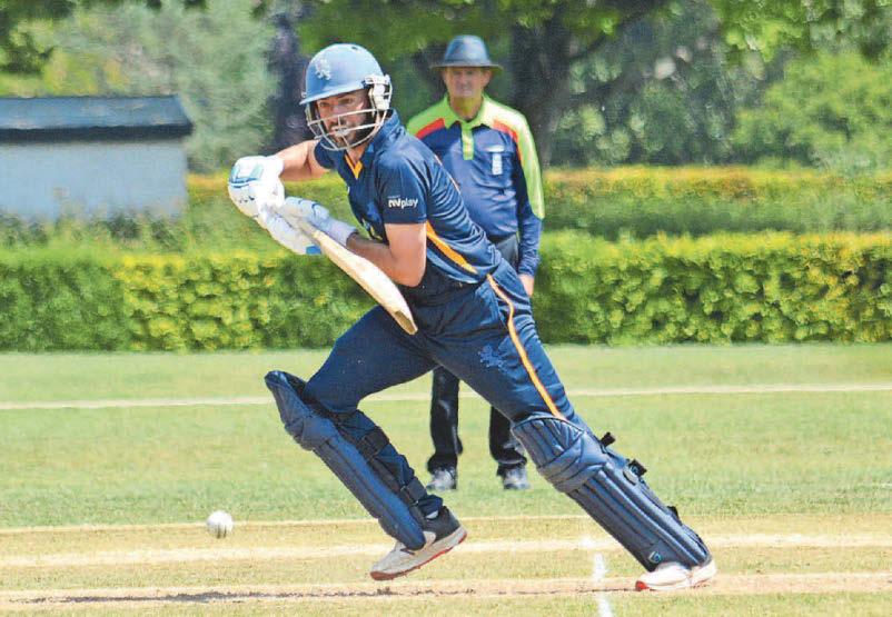 Devon stay on top despite their draw