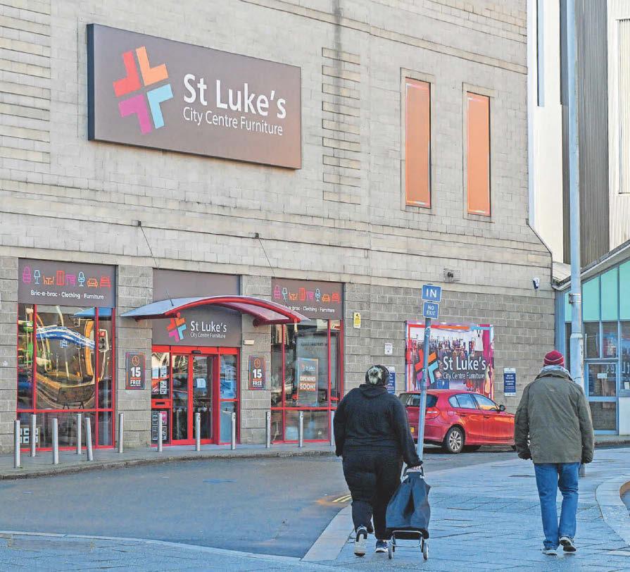 Former Staples reopens as St Luke's charity shop