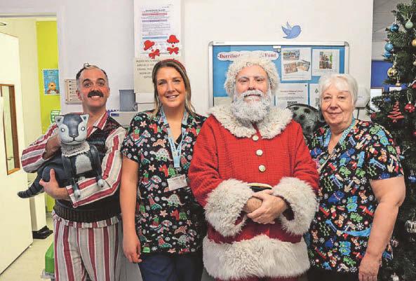 Santa pays a visit to hospital's children's ward