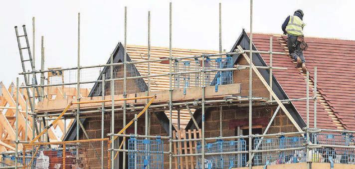 Taylor Wimpey shares fall as cost to fix cladding hits profits