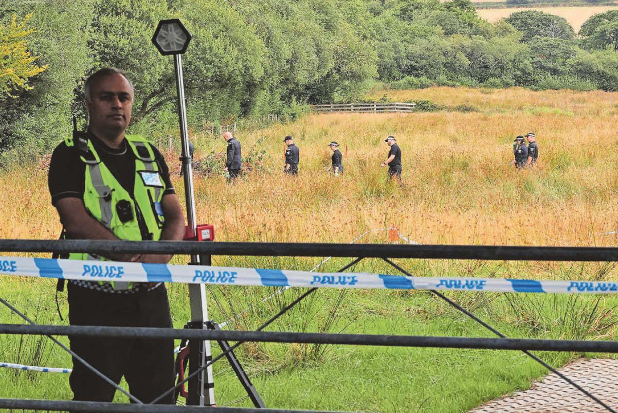 Murder investigation continues at woodland