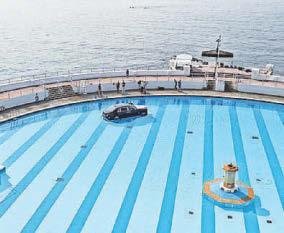 Luxury car takes a dip in Tinside Lido