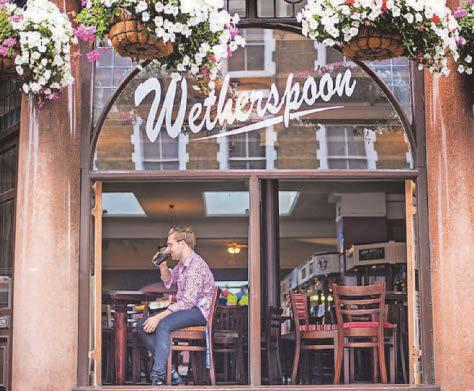 Wetherspoon profits hit by costs and business rates rises