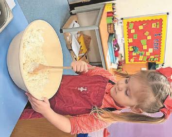 Pupils treat care home residents to poppy-themed biscuits