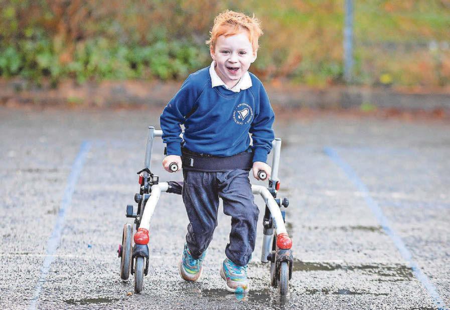 Boy 'run-der' Jacob defies cerebral palsy to run laps to help his ...