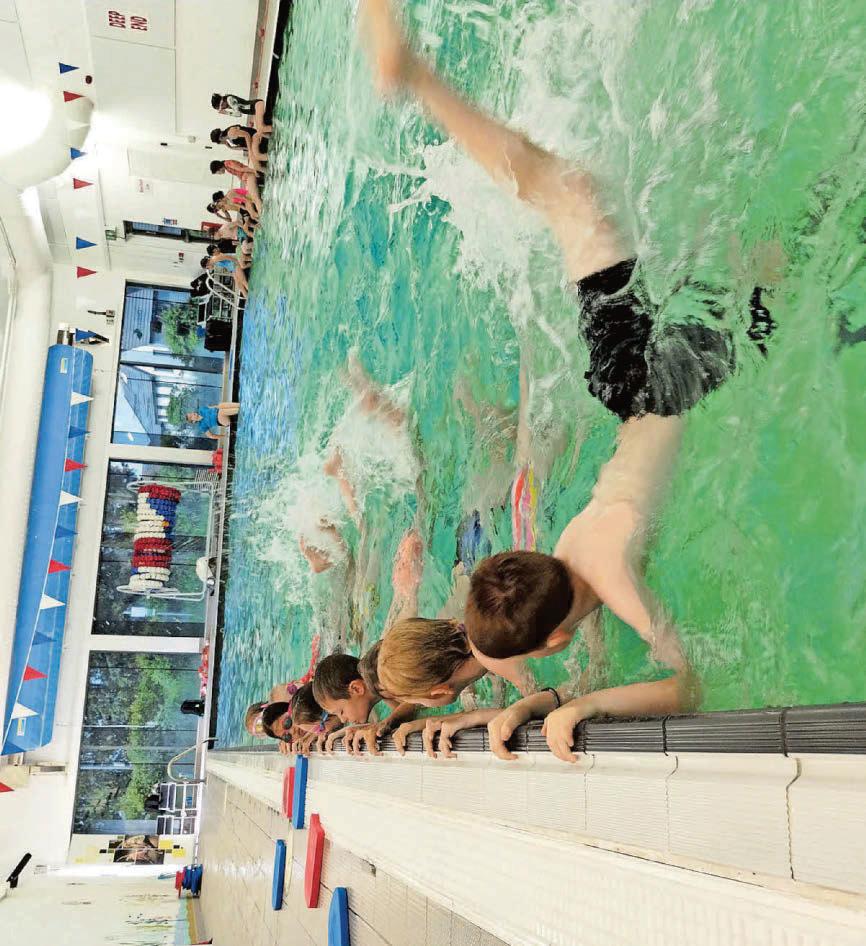 Children learn to swim in lessons funded by harbour