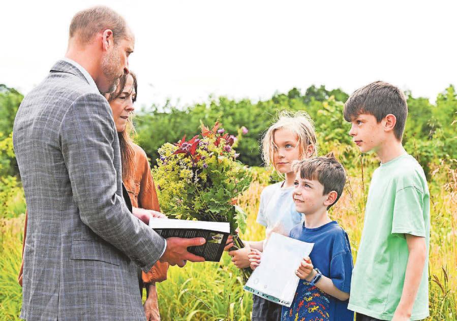 William meets locals and samples fruit on visit to regenerative farm