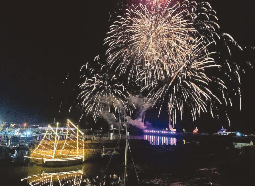 Historic lugger’s lights shine bright in harbour for Christmas switch-on