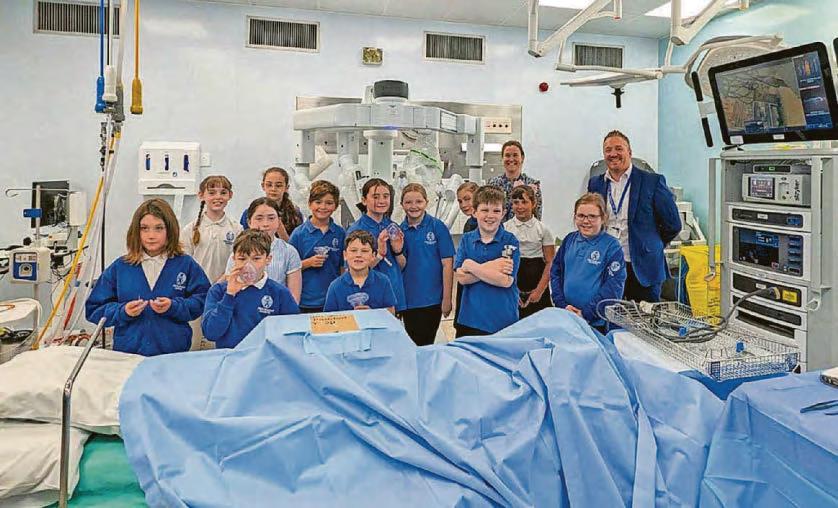 Pupils name £2m robot in hands-on visit to hospital
