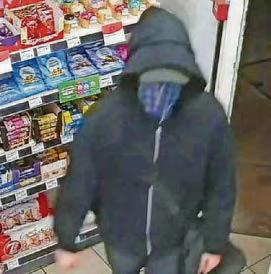 Police appeal after masked knifeman threatens worker
