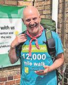 Charity volunteer visits centre on 6,000-mile to raise £50k