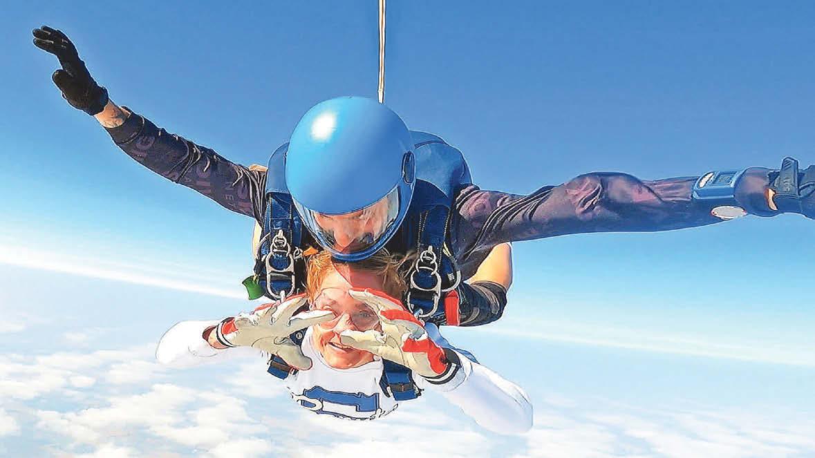 Big leap Daredevil mum Karen, 58, soars through skies for charity