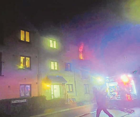 Town rallies round to help victims of flats fire