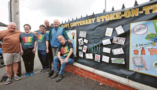 Volunteers sow 20,000 seeds in planters they created to 'brighten up part of city'